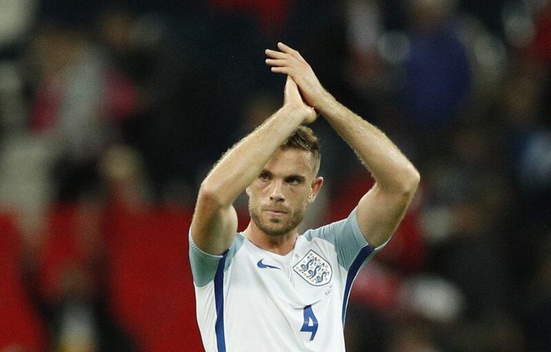 England’s Jordan Henderson applauds the fans after the match. John Sibley / Action Images / Reuters