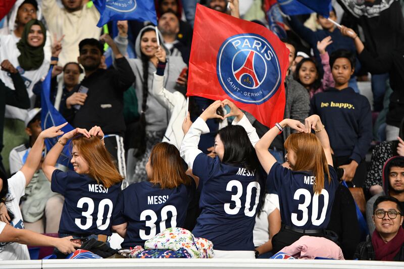 Lionel Messi fans during PSG's training session at the Khalifa International Stadium in Doha. Reuters