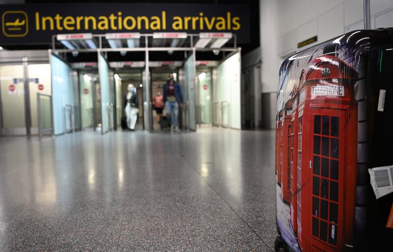 Suitcases filled with cash from government-backed Covid loans were seized at the UK border. EPA