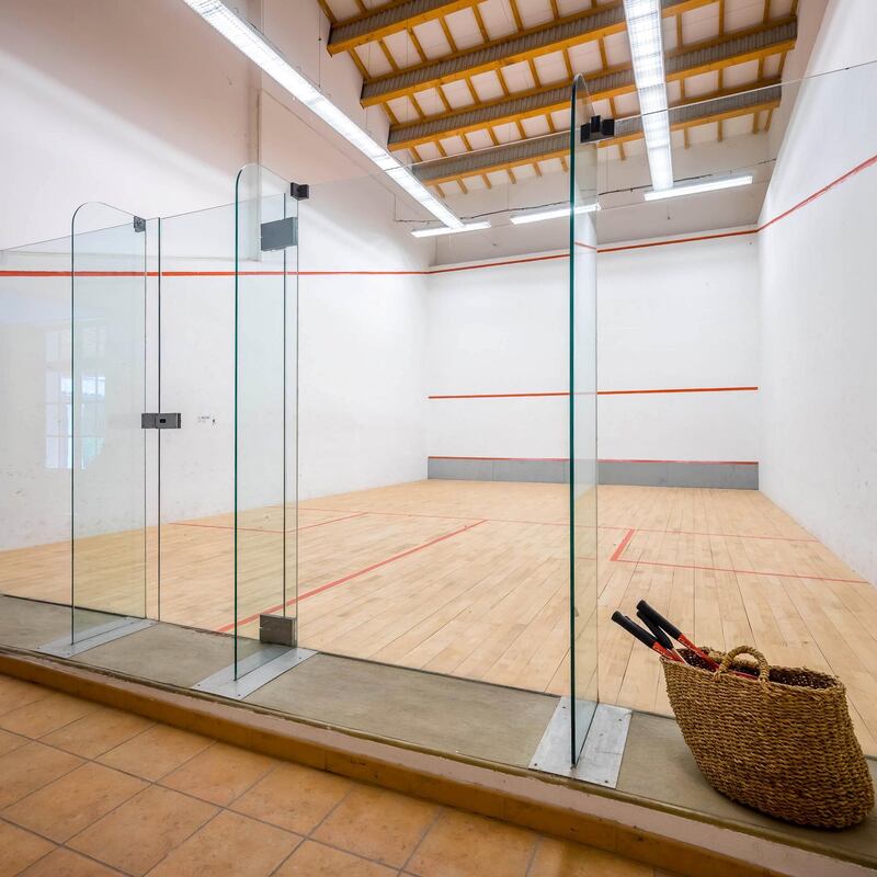 Athletic guests will enjoy the squash courts. Courtesy Chateau De Tourreau