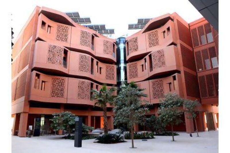 Masdar City also houses Masdar Institute, above, a graduate level university and research organisation occupying eight faculty buildings. Fatima Al Marzooqi / The National