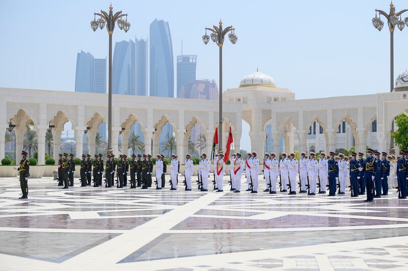 Members of the UAE Armed Forces form a guard of honour. 