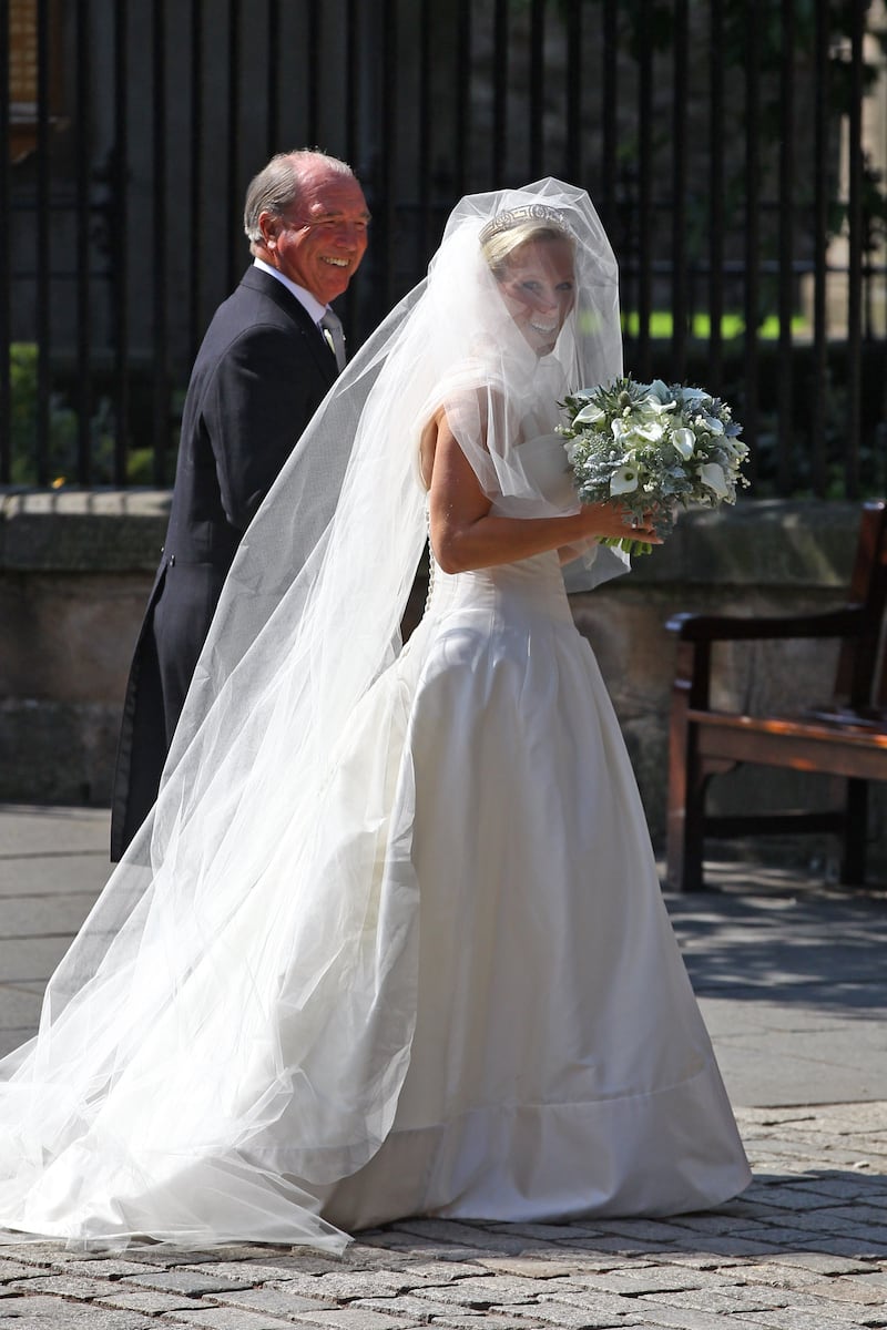Zara Phillips arrives for her wedding to Mike Tindall with her father, Captain Mark Phillips, at Canongate Kirk on July 30, 2011 in Edinburgh, Scotland. Her wedding dress was designed by Stewart Parvin. Getty Images 