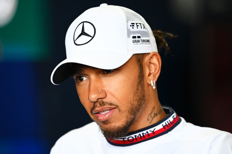 Lewis Hamilton talks to the media ahead of the F1 Grand Prix of Japan at Suzuka International Racing Course. Getty