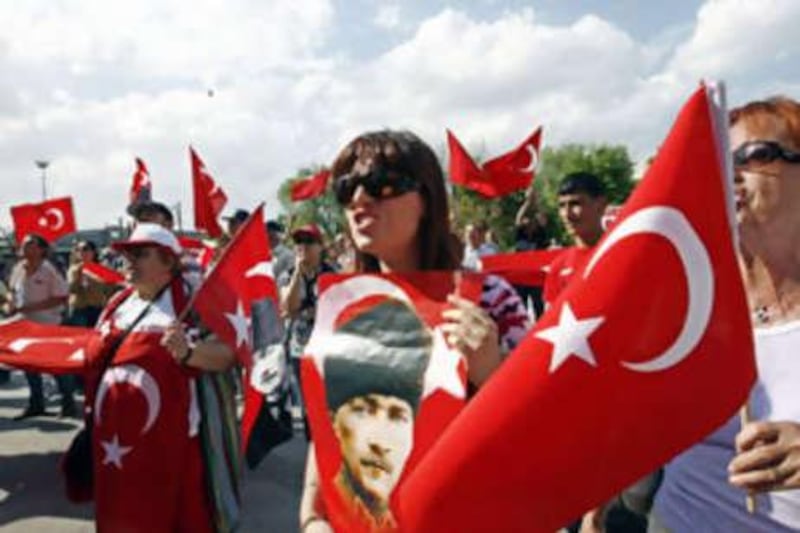 Pro-secular demonstrators, mostly women, chant anti-government slogans in Ankara.