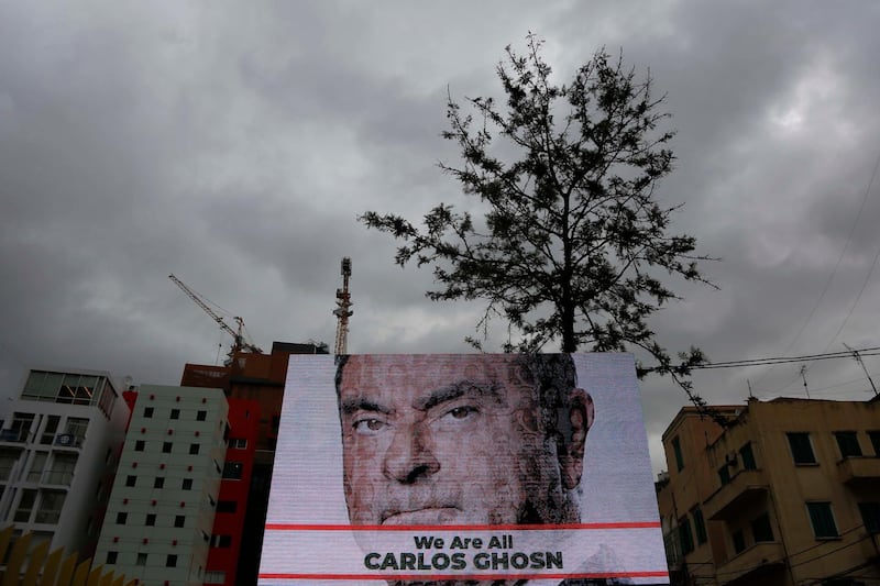 A digital billboard put up by a Lebanese advertising firm as a private initiative shows former Nissan CEO Carlos Ghosn in Beirut, Lebanon, Friday, Dec. 7, 2018. Ghosn, whose grandparents are Lebanese and holds Lebanese citizenship, is in detention after being arrested Nov. 19 on suspicion of underreporting his income. Many Lebanese have rallied around him. (AP Photo/Hassan Ammar)