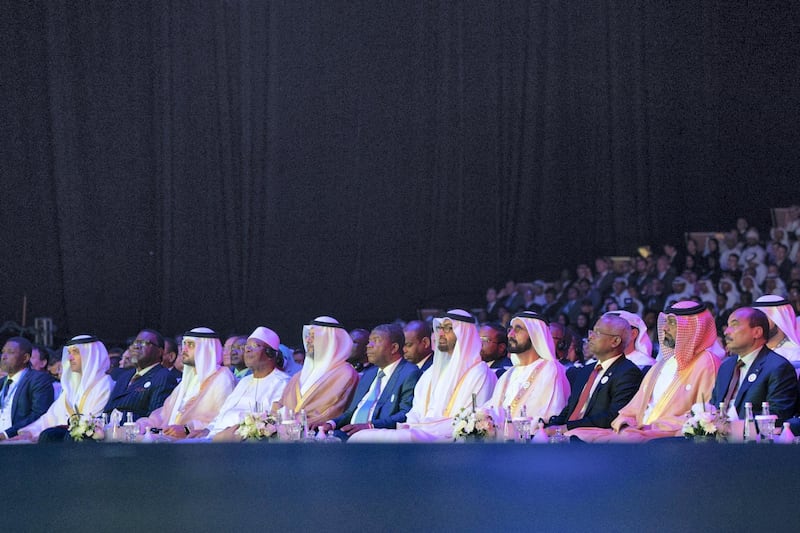 ABU DHABI, UNITED ARAB EMIRATES - January 14, 2019: HH Sheikh Mohamed bin Zayed Al Nahyan, Crown Prince of Abu Dhabi and Deputy Supreme Commander of the UAE Armed Forces (front row 5th R) and HH Sheikh Mohamed bin Rashid Al Maktoum, Vice-President, Prime Minister of the UAE, Ruler of Dubai and Minister of Defence (front row 4th R), attend the opening ceremony of the World Future Energy Summit 2019, part of Abu Dhabi Sustainability Week, at Abu Dhabi National Exhibition Centre (ADNEC). Seen with (front row) HE Mohamed Ould Abdel Aziz, President of Mauritania (R), HH Sheikh Ammar bin Humaid Al Nuaimi, Crown Prince of Ajman (2nd R), HE Ibrahim Mohamed Solih, President of the Maldives (3rd R), HE Joao Manuel Lourenco, President of Angola (6th R), HH Sheikh Sultan bin Mohamed Al Qasimi, Crown Prince of Sharjah (7th R), HE Ibrahim Boubacar Keita, President of Mali (8th R), HH Sheikh Maktoum bin Mohamed bin Rashid Al Maktoum, Deputy Ruler of Dubai (9th R), HE Hage Geingob, President of Namibia (10th R) and HH Sheikh Hazza bin Zayed Al Nahyan, Vice Chairman of the Abu Dhabi Executive Council (11th R). 

( Mohamed Al Hammadi / Ministry of Presidential Affairs )
---