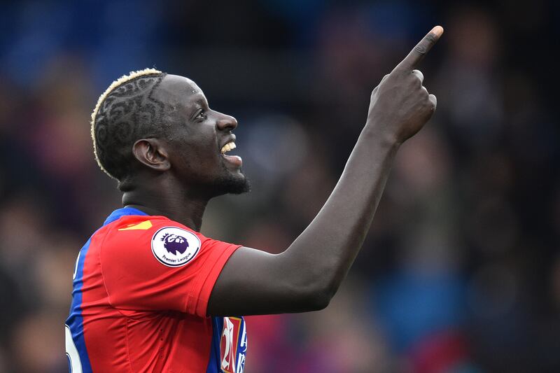 Crystal Palace's French midfielder Mamadou Sakho gestures as he celebrates on the pitch after the English Premier League football match between Crystal Palace and Watford at Selhurst Park in south London on March 18, 2017.
Crystal Palace won the game 1-0. / AFP PHOTO / Glyn KIRK / RESTRICTED TO EDITORIAL USE. No use with unauthorized audio, video, data, fixture lists, club/league logos or 'live' services. Online in-match use limited to 75 images, no video emulation. No use in betting, games or single club/league/player publications.  / 