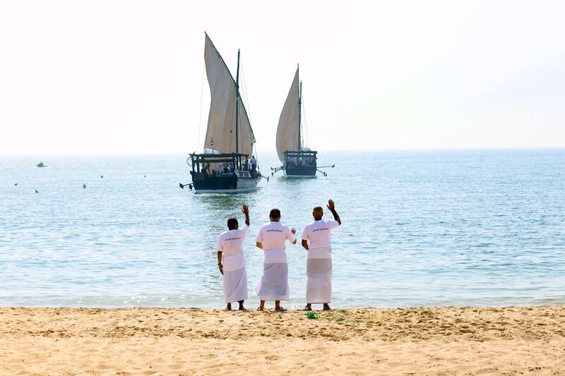 Kuwaiti youths as they set to sail aboard traditional dhows for a pearl diving expedition near Kuwait City. AFP