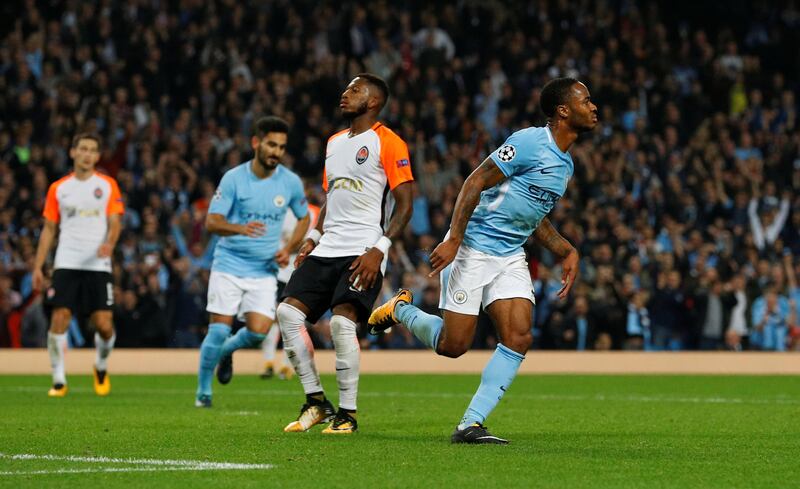 Raheem Sterling celebrates scoring Manchester City's second goal. Phil Noble / Reuters