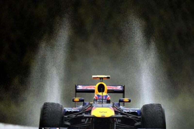 Mark Webber splashed his way to the top of the speed charts Friday during practice for Sunday's Belgian Grand Prix.
