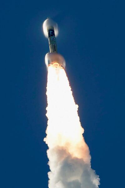 FILE - In this July 20, 2020, file photo, an H-IIA rocket with United Arab Emirates' Mars orbiter Hope lifts off from Tanegashima Space Center in Kagoshima, southern Japan. The UAE spacecraft named Amal, or Hope, will scrutinize the Martian atmosphere from orbit. (Hiroki Yamauchi/Kyodo News via AP, File)