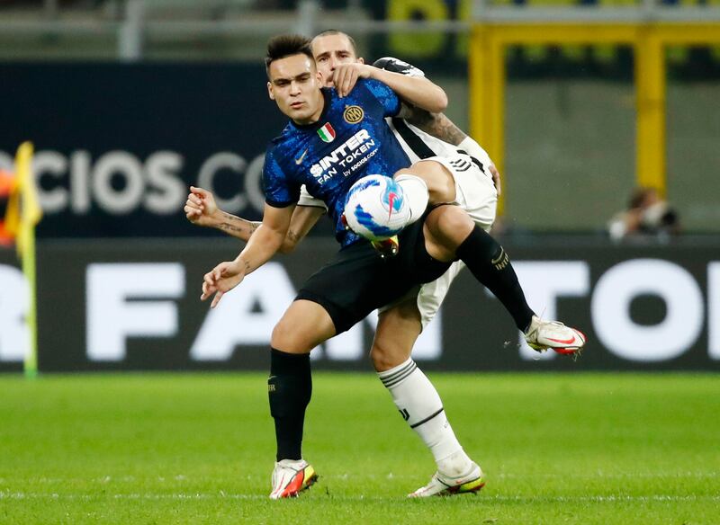 Lautaro Martinez attempts to control the ball under pressure from Juventus defender Leonardo Bonucci. Reuters