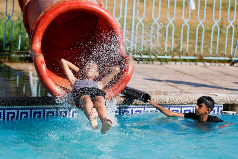 A child makes a splash. Reuters
