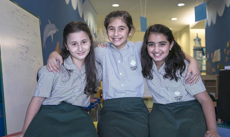 Tamara Khoury, left, Cynthia Stephan, centre, and Afra Al Ali take bullying problems at school very seriously. Silvia Razgova / The National