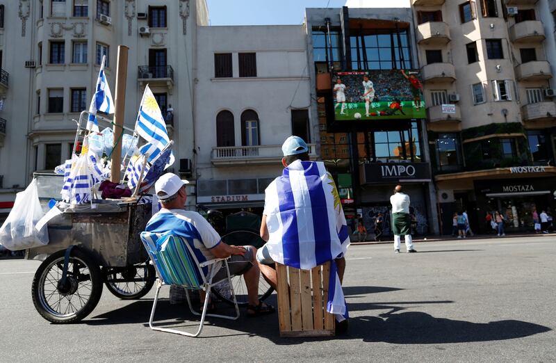 Uruguay fans watch the match between Uruguay and Portugal at the Qatar World Cup on a screen in Montevideo. Reuters