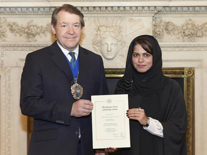 Hind Eisa Salim, vice president and senior relationship manager at Mashreq Bank, receives the Mansion House Scholarship certificate from Roger Gifford, the lord mayor of London, on Friday. Courtesy: City of London