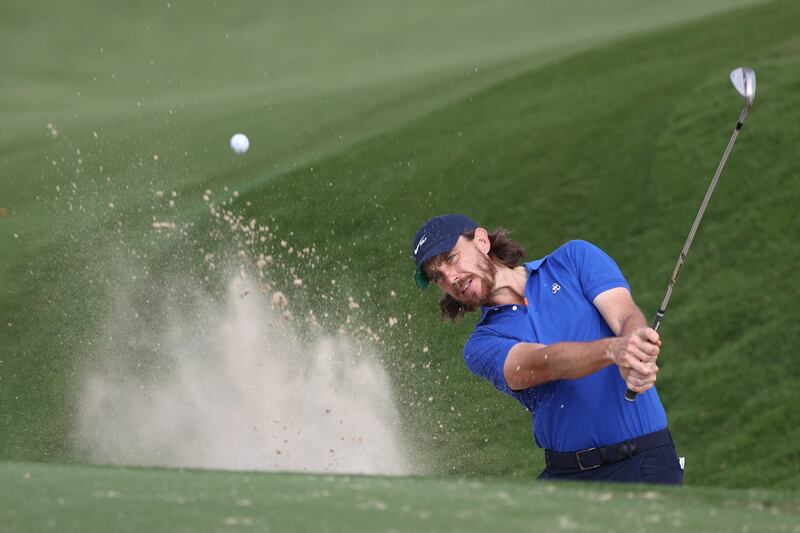 Tommy Fleetwood hits out of a bunker during a practice round ahead of the Abu Dhabi HSBC Championship at Yas Links. Getty