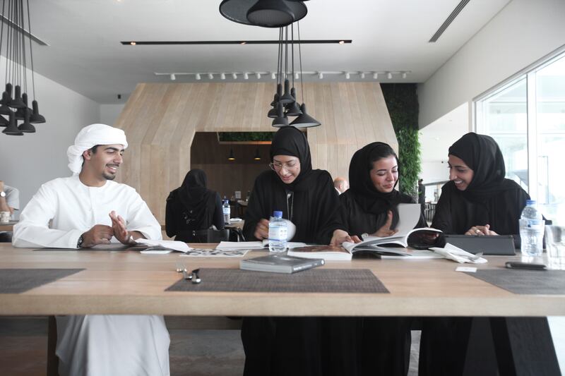 January 31, Dubai, UAE:

Left to right: Meet Mohammad Suhail AlBanna, Zainab AlHammadi, Maryam AlMansoori, and Sarah AlHammadi. These 4 enterprising Emiratis (all from Dubai) are starting a magazine, along with others, which will be fully staffed by locals. Their goal? To educate residents and visitors to the country about their culture, their history, and whats going on around the country at the moment. 

They are seen here chatting inside of the Dubai Pavilion. 


Lee Hoagland/The National