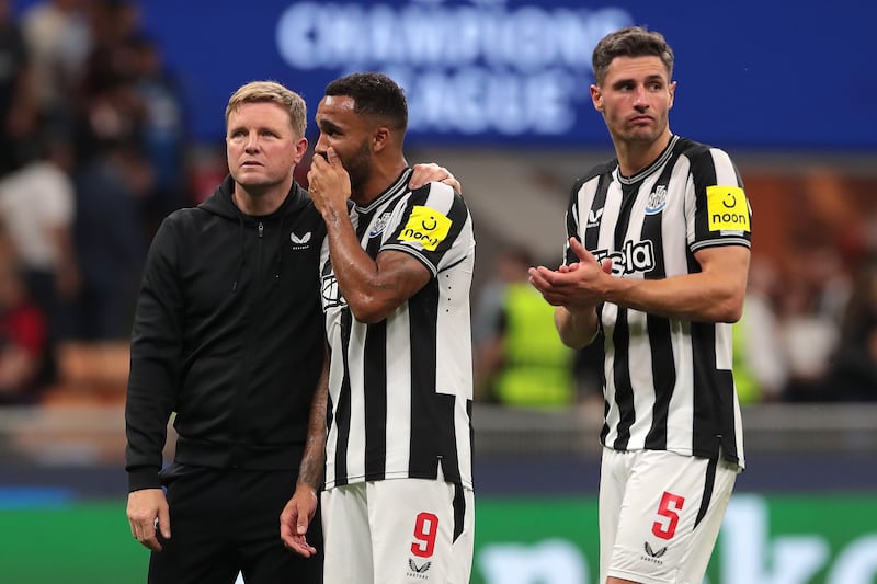 Newcastle manager Eddie Howe with consoles Callum Wilson after their draw with AC Milan in their Champions League Group F at San Siro on Tuesday, September 19, 2023. Getty