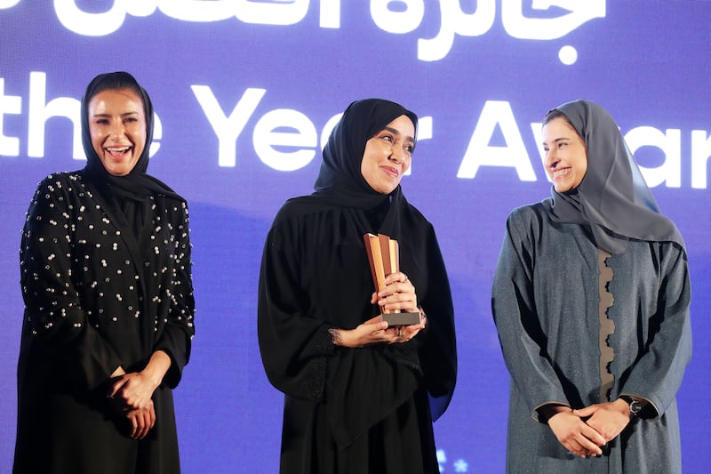Salama Al Mazrouei, centre, of Qatr Al Nada High School wins Principal of the Year