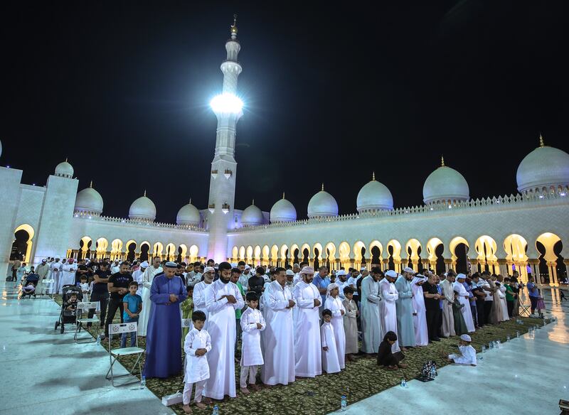 Isha prayers are performed at the Sheikh Zayed Grand Mosque in Abu Dhabi. Victor Besa / The National