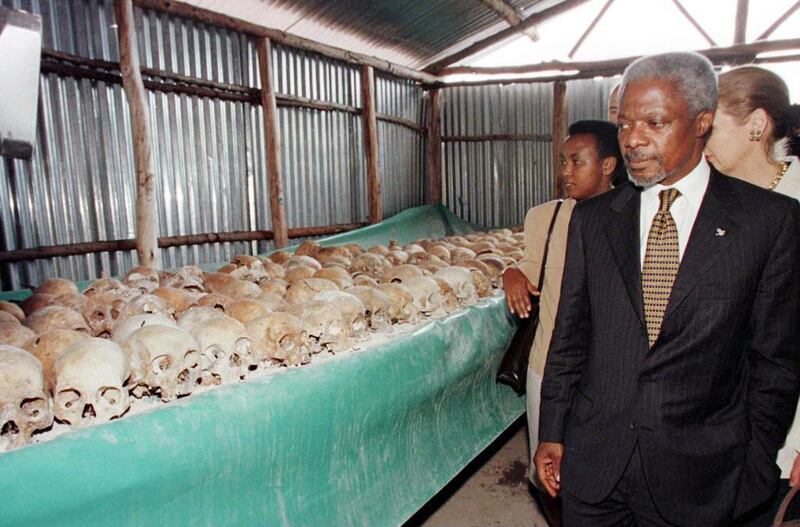 (FILES) In this file photo taken on May 8, 1998 UN Secretary General Kofi Annan walks by skulls at the Mulire Genocide memorial. - Former United Nations Secretary General and Nobel Peace Prize laureate Kofi Annan has died on August 18, 2018 after a short illness at the age of 80, his foundation announced. "It is with immense sadness that the Annan family and the Kofi Annan Foundation announce that Kofi Annan, former Secretary General of the United Nations and Nobel Peace Laureate, passed away peacefully on Saturday 18th August after a short illness," the foundation said in a statement. (Photo by ALEXANDER JOE / AFP)