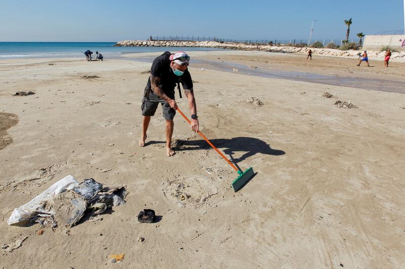 As individuals and groups help out in clearing beaches after an oil spill drenched much of the Mediterranean shoreline in Tyre Nature Reserve, south Lebanon, local authorities asked the UN, which has a presence in Lebanon, to consider assisting. Reuters
