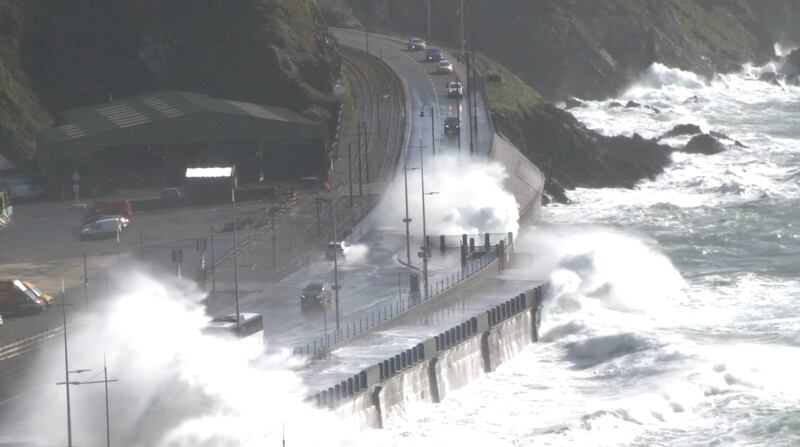 Waves crash over cars along the promenade coastal road as Storm Kathleen makes its way through the British Isles, in Douglas, Isle of Man. Wild Enthusiasm / Reuters