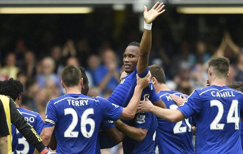Chelsea's Didier Drogba, centre, is carried off the pitch by his teammates after being substituted against Sunderland during a Premier League soccer match at Stamford Bridge in London, Britain, 24 May 2015. EPA/ANDY RAIN