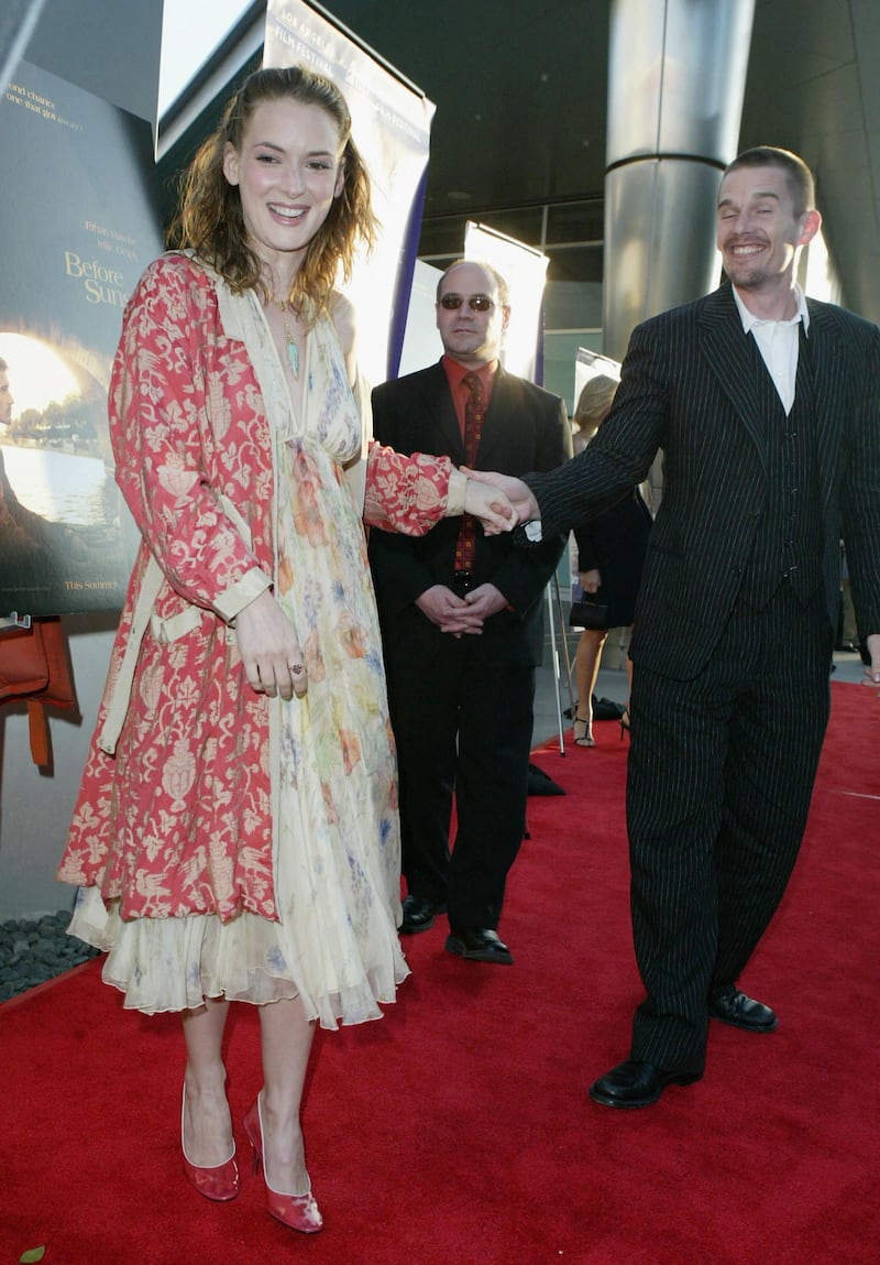 Winona Ryder in a boho-inspired outfit with actor Ethan Hawke at the Los Angeles Film Festival Premiere of 'Before Sunset' at the Archlight Cinema  on June 23, 2004. Getty