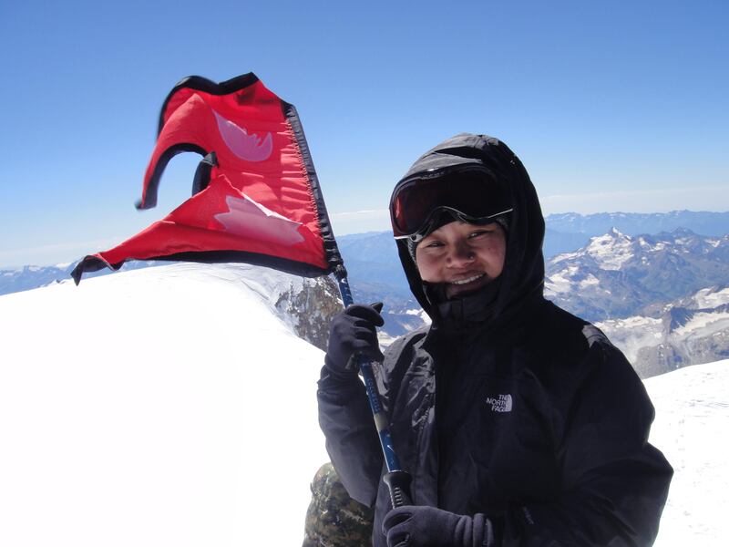 Maya proudly waves Nepali flag atop Elbrus.

Weekend story about a group of women planning to scale all the major seven summits of the world.

Photo courtesy Seven Summits Women