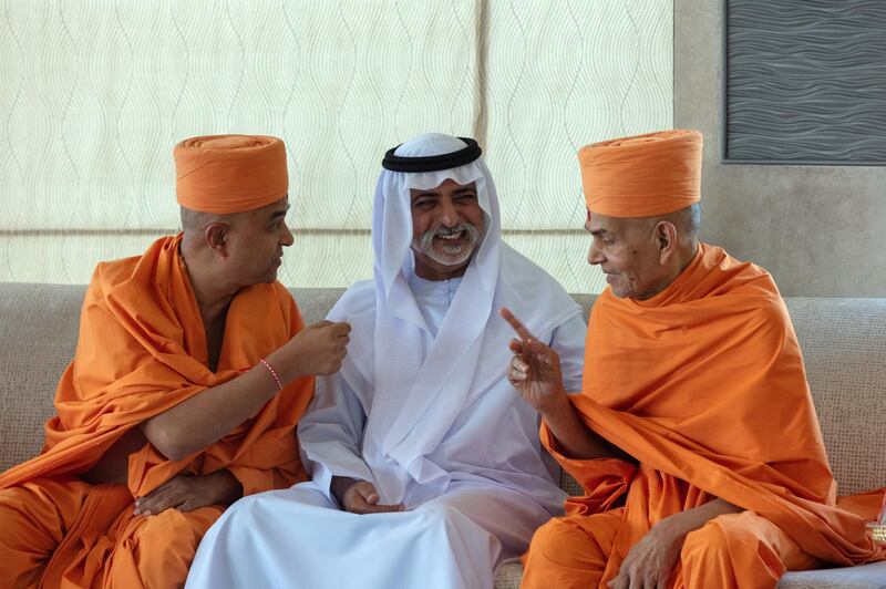 His Holiness Mahant Swami Maharaj converses with Sheikh Nahyan at the royal Majlis.