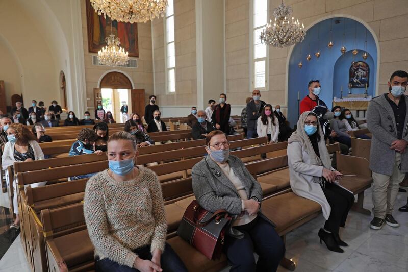 Worshippers attend a Christmas mass for the Armenian Orthodox in the Lebanese town of Antelias, north of Beirut. AFP