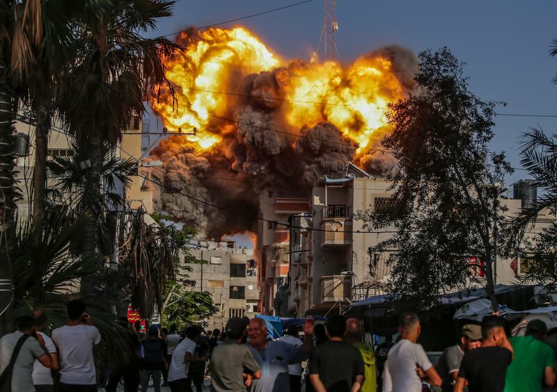An explosion following an Israeli air strike on Al Bureije refugee camp in the southern Gaza Strip. EPA