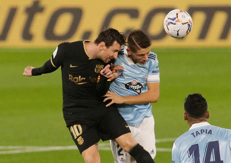 Barcelona’s Lionel Messi in action with Celta Vigo’s Jose Manuel Fontan. Reuters