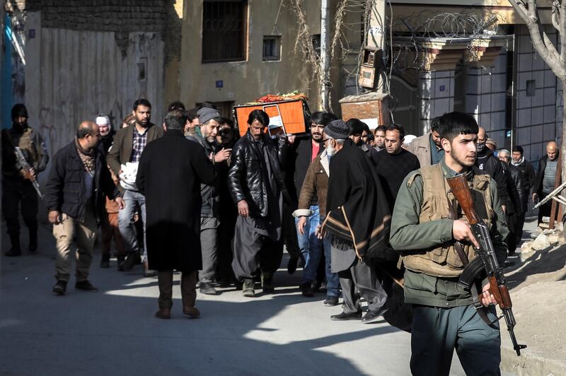 People carry the coffin of an Afghan female judge in Kabul, Afghanistan. EPA