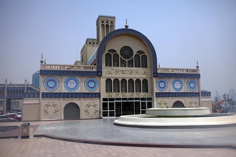 One of the entrances to the Central Market, also known as the Blue Souq, in Sharjah. It was built in 1979 and is adorned with Islamic designs. The market can be seen on the Arabic side of the Dh5 banknote.