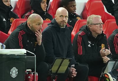 Manchester United manager Erik ten Hag watches on from the dugout during the 7-0 defeat to Liverpool at Anfield. EPA