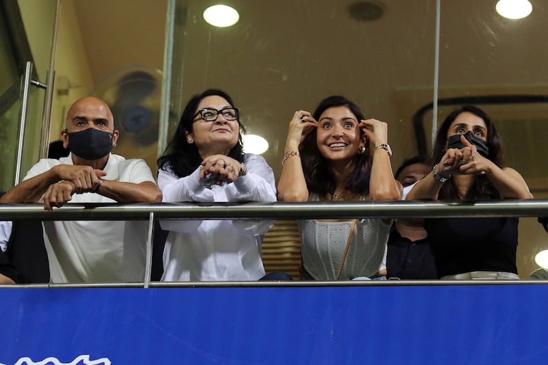 Bollywood star Anushka Sharma, wife of Virat Kohli, watches the IPL 2022 match between Royal Challengers Bangalore and Delhi Capitals at the Wankhede Stadium in Mumbai on Saturday, April 16, 2022. Sportzpics for IPL