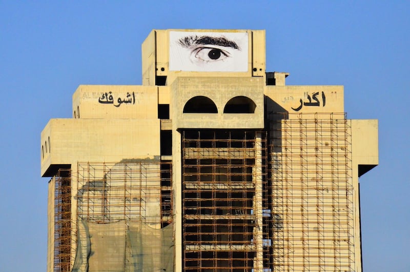 'I Can See You' (2013) by Sajjad Abbas, an enlarged photograph of his eye on the 'Turkish Building' in Baghdad facing the Green Zone. Photo: Berlin Biennale