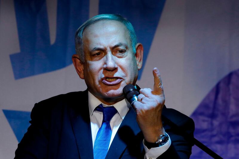 Israeli Prime Minister Benjamin Netanyahu addresses Likud party supporters during an electoral meeting in the Israeli city of Petah Tikva near Tel Aviv on December 18, 2019.  / AFP / Jack GUEZ 
