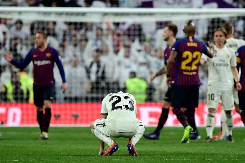 Real Madrid's Spanish defender Sergio Reguilon bends down at the final whistle. AFP