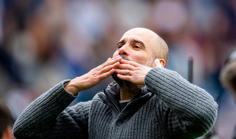 Manchester City manager Pep Guardiola celebrates after the  Premier League win against Burnley. EPA