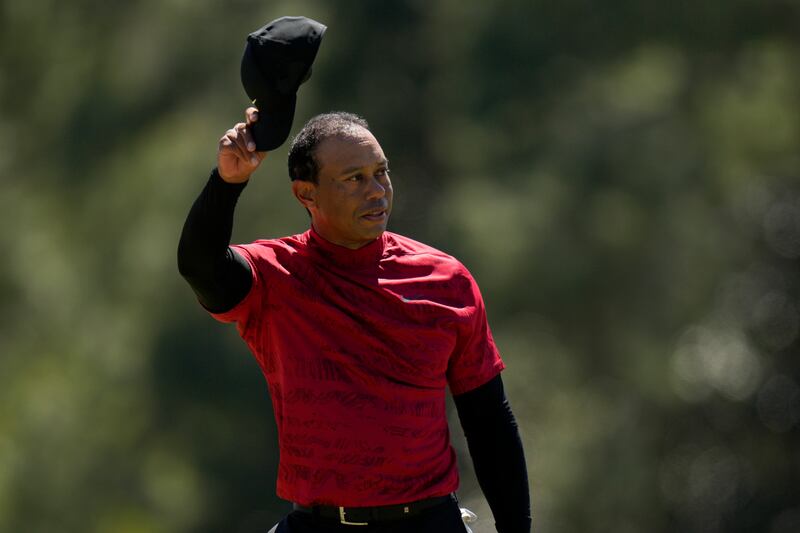 Tiger Woods tips his cap on the 18th green during the final round at the Master. AP