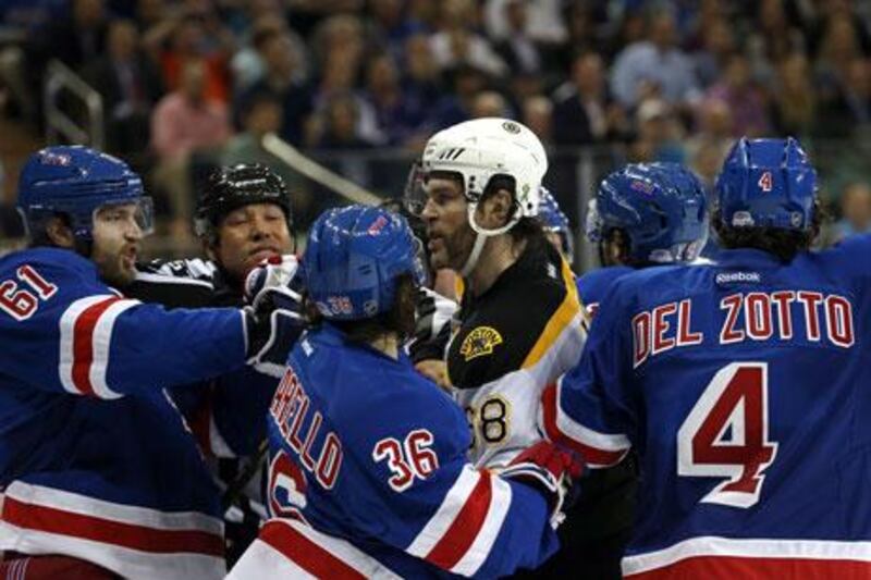 It was feisty game at Madison Square Garden with Jaromir Jagr, No 68, of the Boston Bruins, fighting with Rick Nash, No 61, of the New York Rangers. Bruce Bennett / Getty Images / AFP