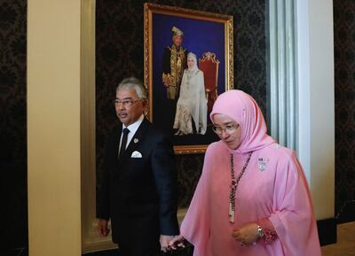 Sultan Abdullah of Pahang with Queen Tunku Azizah Aminah Maimunah Iskandariah after an interview with the media in Kuala Lumpur last month. Reuters