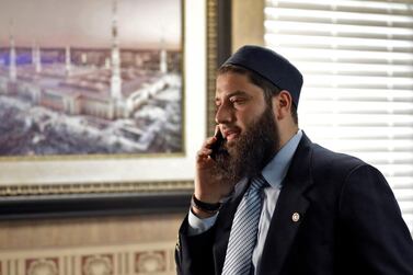 Hassan Shibly, lawyer for Hoda Muthana, the Alabama woman who left home to join ISIS, speaks on a phone in Tampa Florida, February 20, 2019. AP