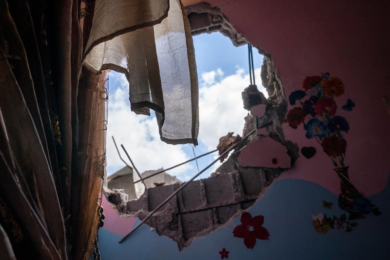 An Israeli air strike blew this hole in the wall of a child's room in Beit Hanoun, the northern Gaza Strip. AP Photo