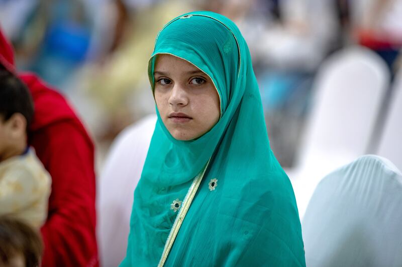 Afghan evacuees arrive at the Emirates Humanitarian City in Abu Dhabi. Victor Besa / The National.